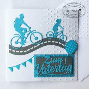 Vatertagskarte mit Fahrrad und Kind